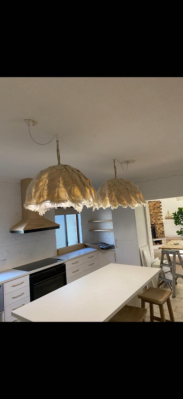 Pendant lights over a kitchen island